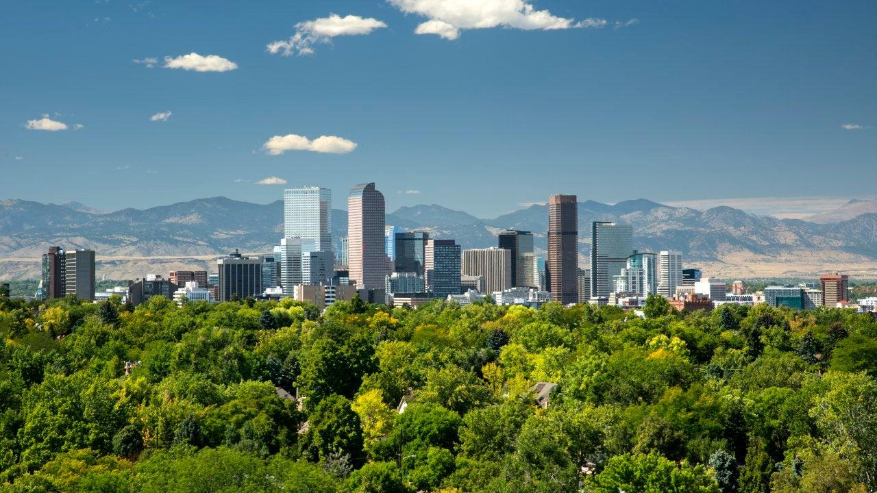 Denver, CO skyline with mountains